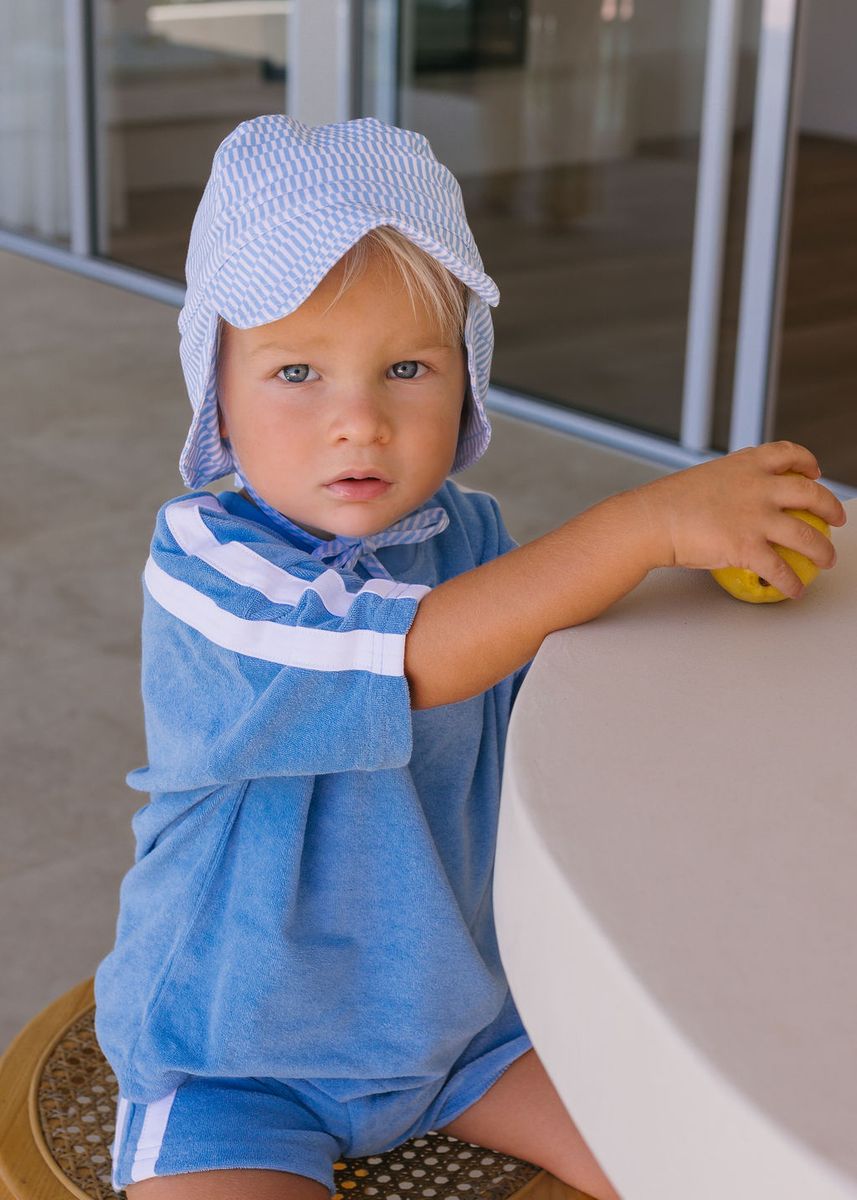 Acorn Kids Blue Sprinkle Soft Jersey Flap Cap in Blue and Cream