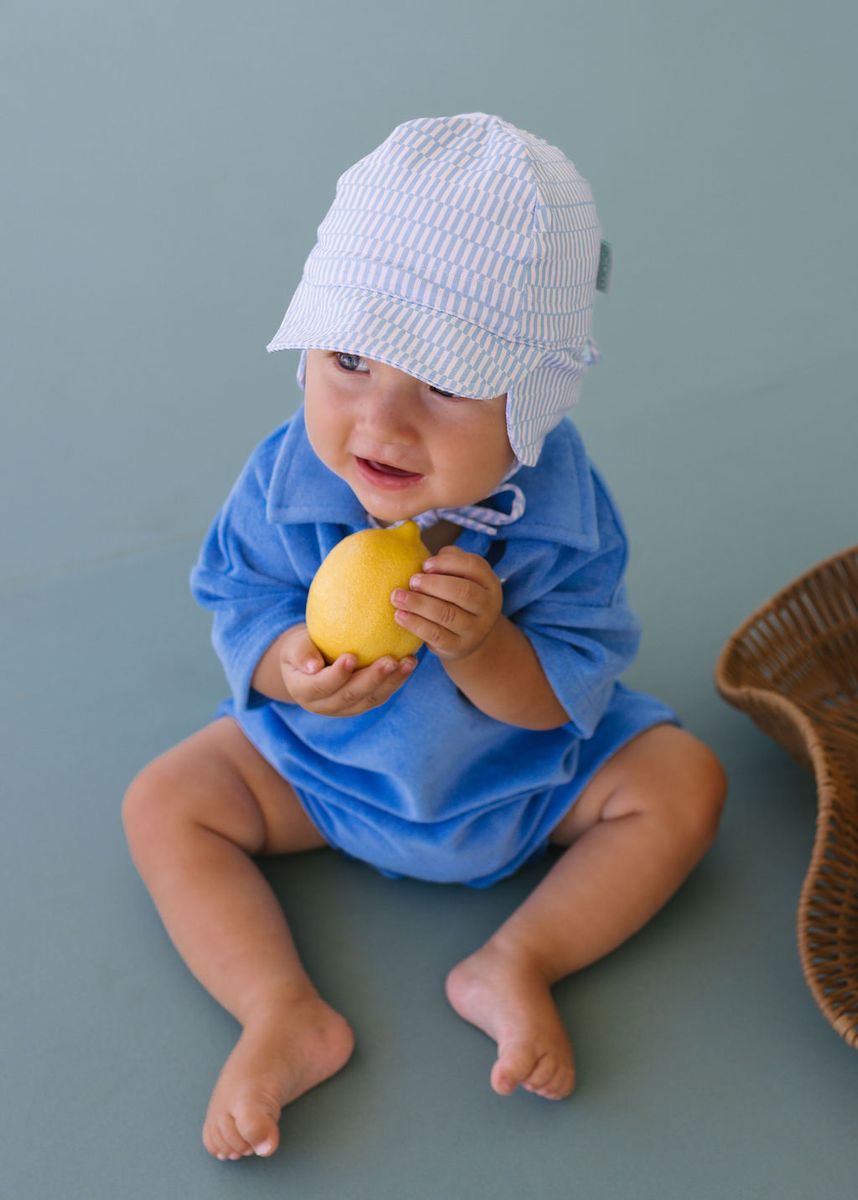 Acorn Kids Blue Sprinkle Soft Jersey Flap Cap in Blue and Cream