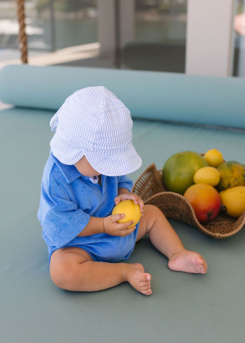 Acorn Kids Blue Sprinkle Soft Jersey Flap Cap in Blue and Cream