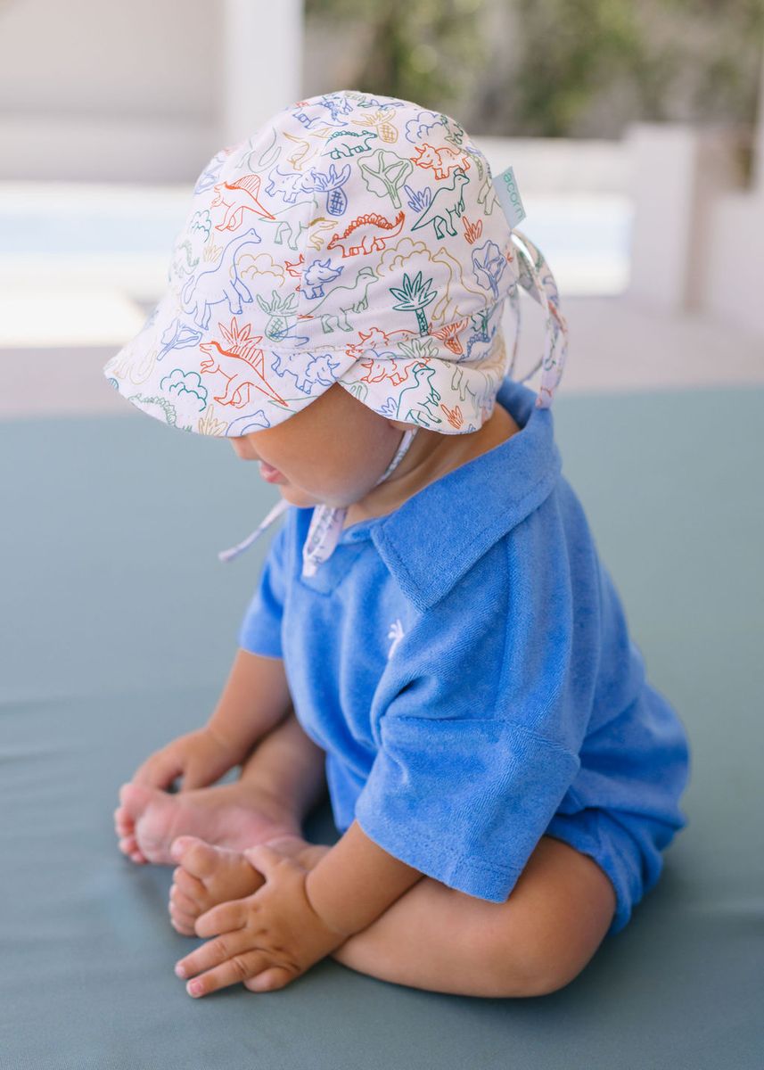 Acorn Kids Dino Soft Jersey Flap Cap in Natural and Multi