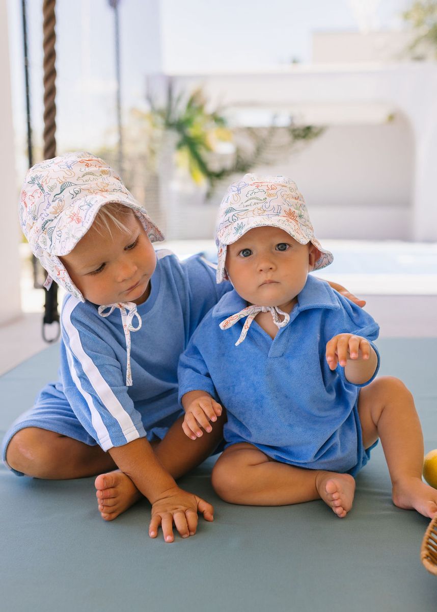 Acorn Kids Dino Soft Jersey Flap Cap in Natural and Multi