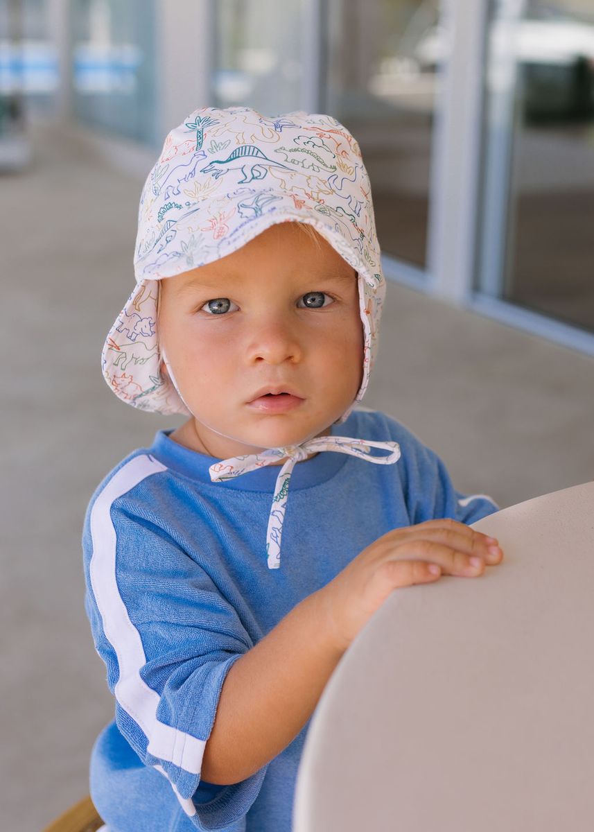 Acorn Kids Dino Soft Jersey Flap Cap in Natural and Multi